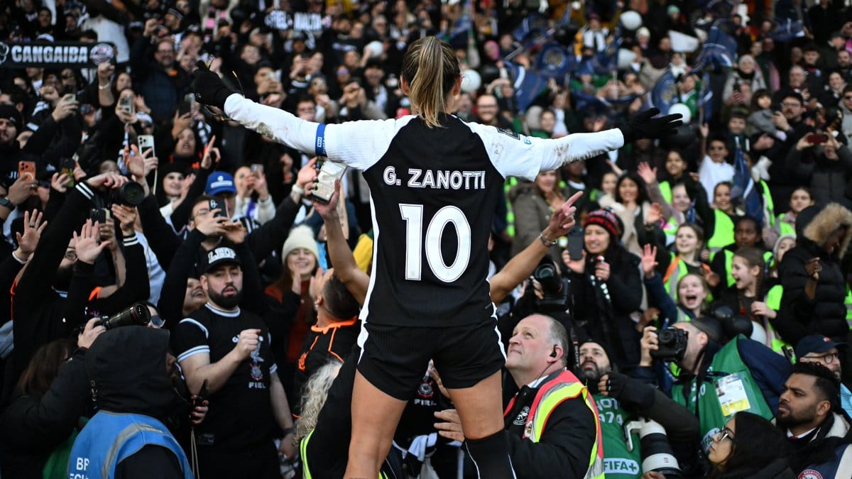Corinthians' captain and goalscorer, Zanotti, celebrating with the rowdy Corinthians fans after beating Gotham